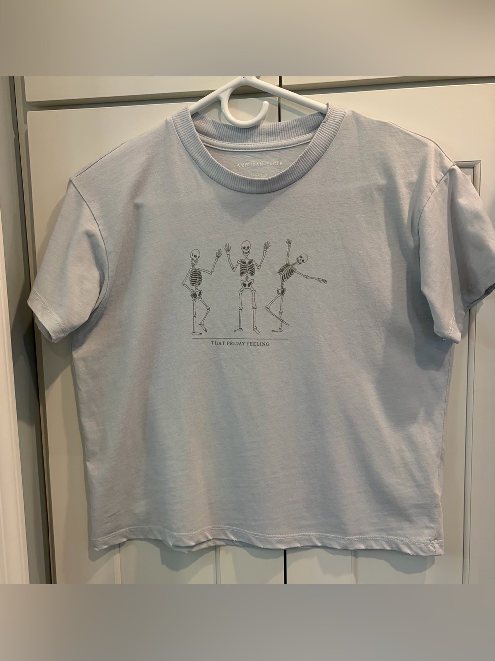 American Eagle Outfitters Light Blue Graphic Tee with Dancing Skeletons